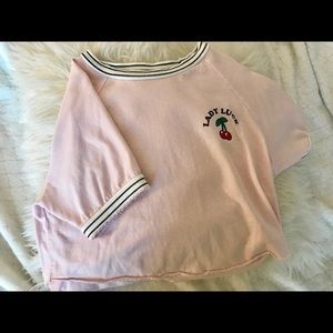 Baby pink cropped shirt with cool striped details